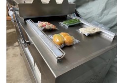 Vacuum sealing packing machine